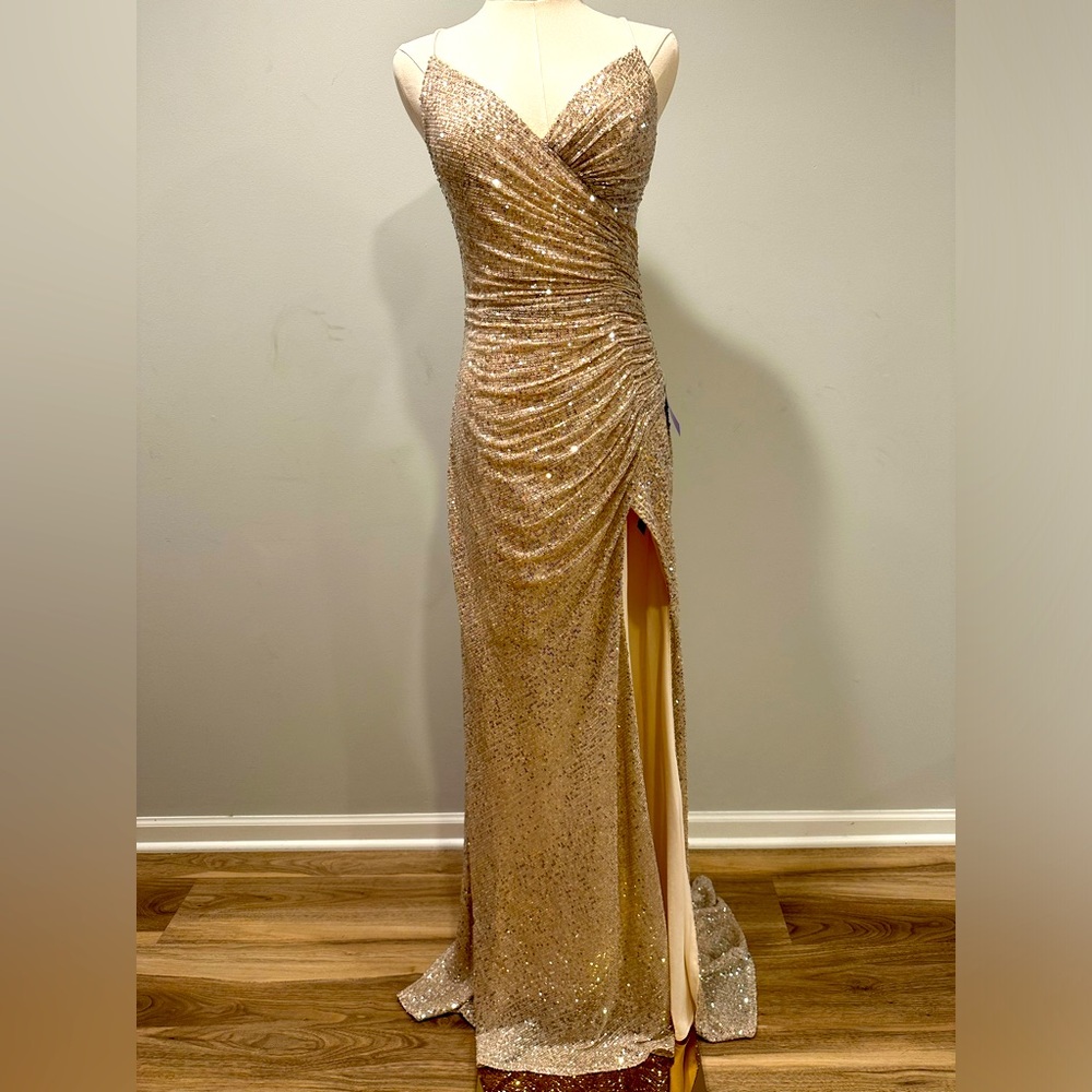 Simple but gorgeous, gold sequin dress. NWT, size large.
